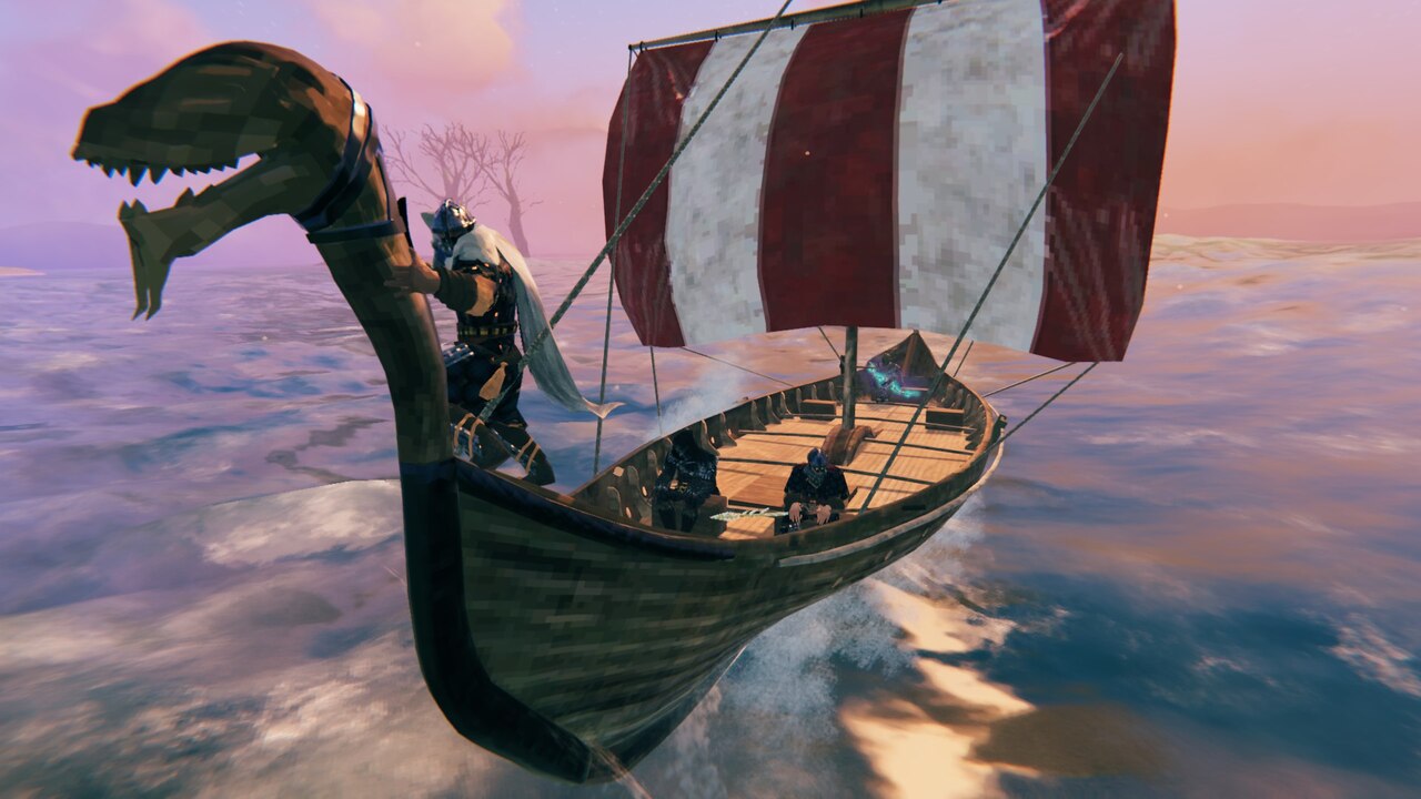 Valheim players sailing a carved longship across the ocean at sunset